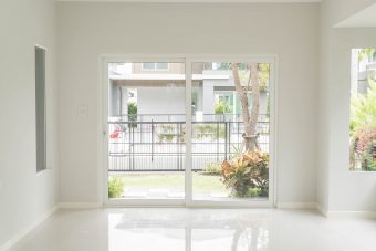 empty glass door in living room interior background